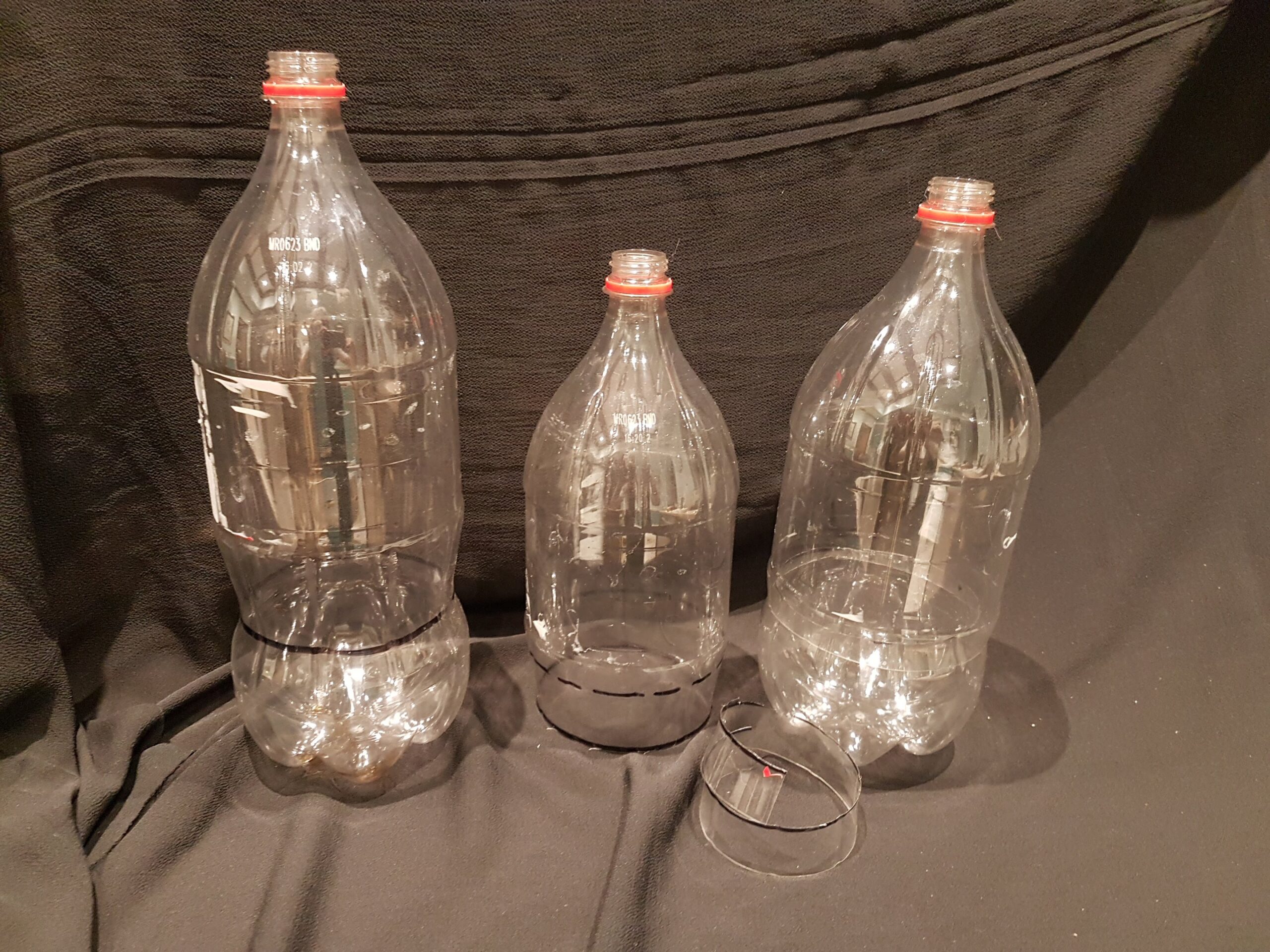 'nesting'winter sowing containers made from coke bottles.